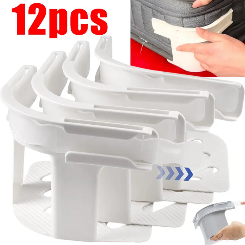 Twelve white invisible bed sheet fixing clips are shown in various angles and a hand is demonstrating their use.