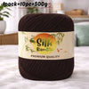 A dark brown ball of silk bamboo blend yarn labeled as premium quality for knitting and crochet.