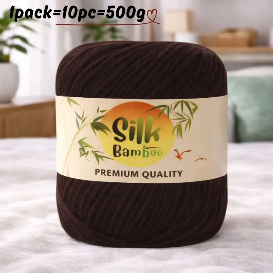 A dark brown ball of silk bamboo blend yarn labeled as premium quality for knitting and crochet.