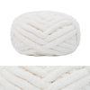 A ball of white hand-knitted wool finger line scarf with a textured, braided appearance.