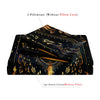 A set of two pillowcases and one duvet cover featuring a dark blue background with gold celestial patterns.