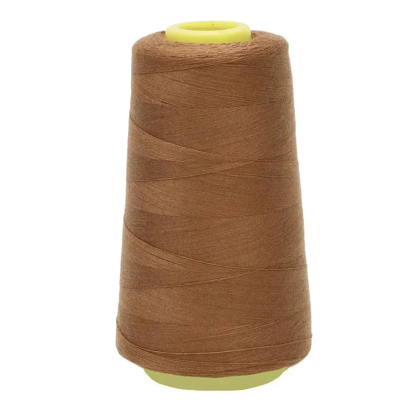 A roll of brown sewing thread with a light yellow core.