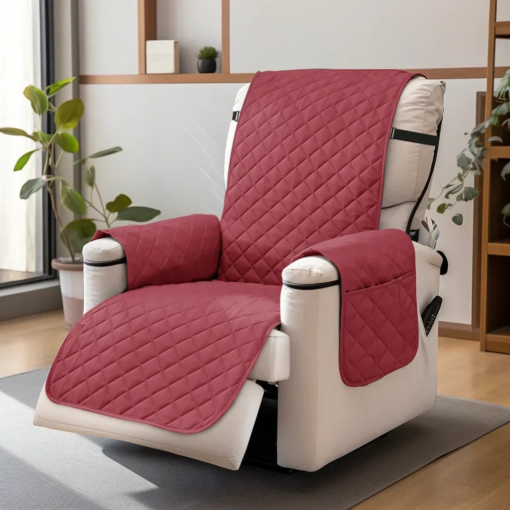 A maroon washable slipcover is fitted onto a white recliner sofa with black straps, resting on a gray rug.