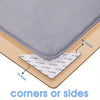 A gray reusable non-slip rug gripper demonstrating how to use the product on carpet or floor surfaces.