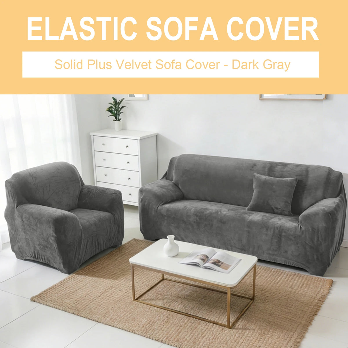 A dark gray elastic sofa cover is displayed on a velvet sofa in a bright living room setting.