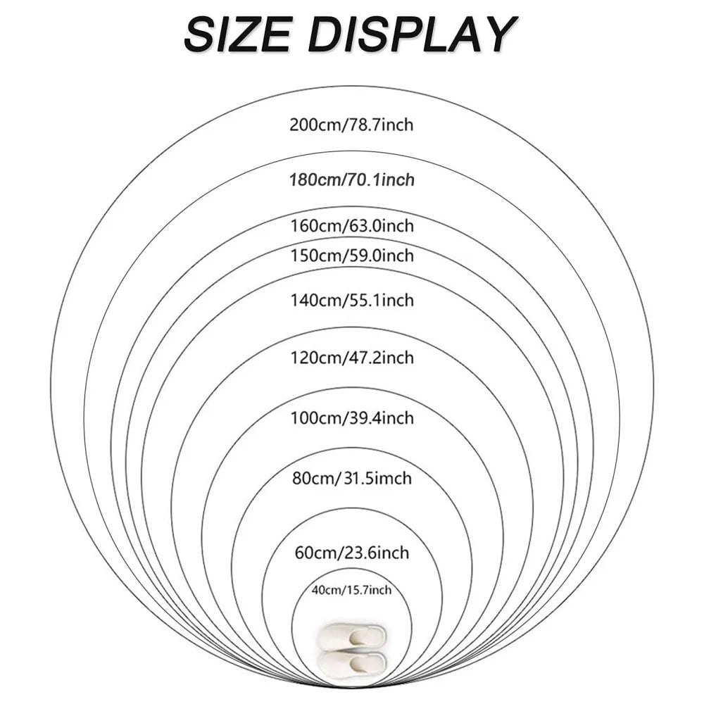 A display showing various sizes of a round rug, ranging from 60cm to 200cm, arranged in concentric circles.