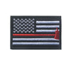 A black flag patch featuring the American flag design with a red hook attached to the hoist side.