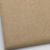 Close-up texture of beige coarse linen and cotton fabric for DIY projects