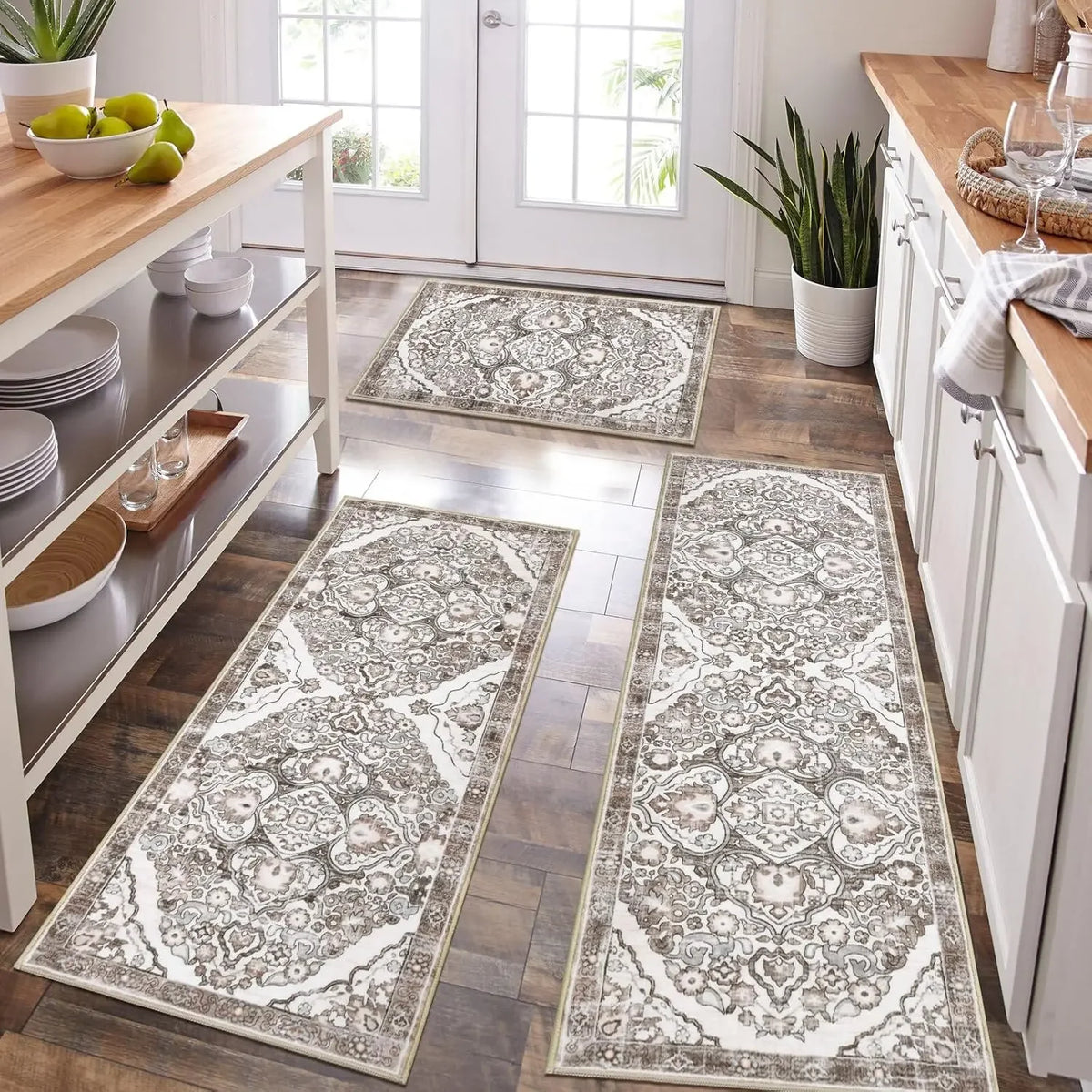 A set of large, rectangular anti-slip floor rugs with intricate bohemian patterns placed on a wooden floor.