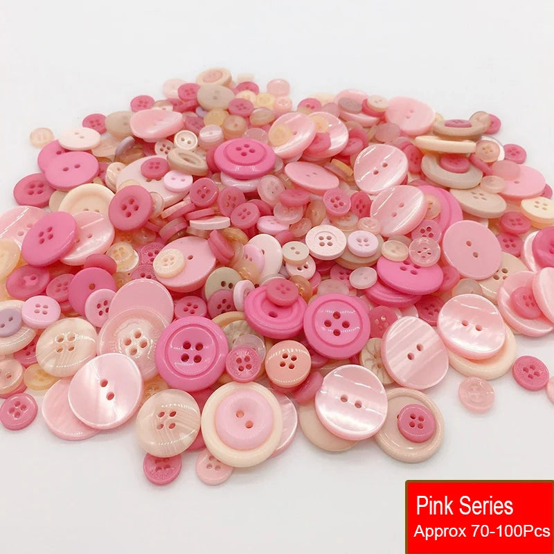 A pile of assorted pink resin sewing buttons in various shades and sizes for crafting projects