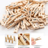 A pile of mini wooden clothespins with strength spring used for photo displays and DIY crafts