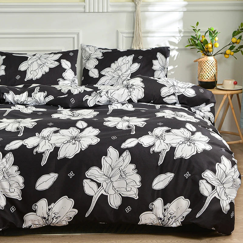 Black duvet cover set with white floral print and matching pillowcases