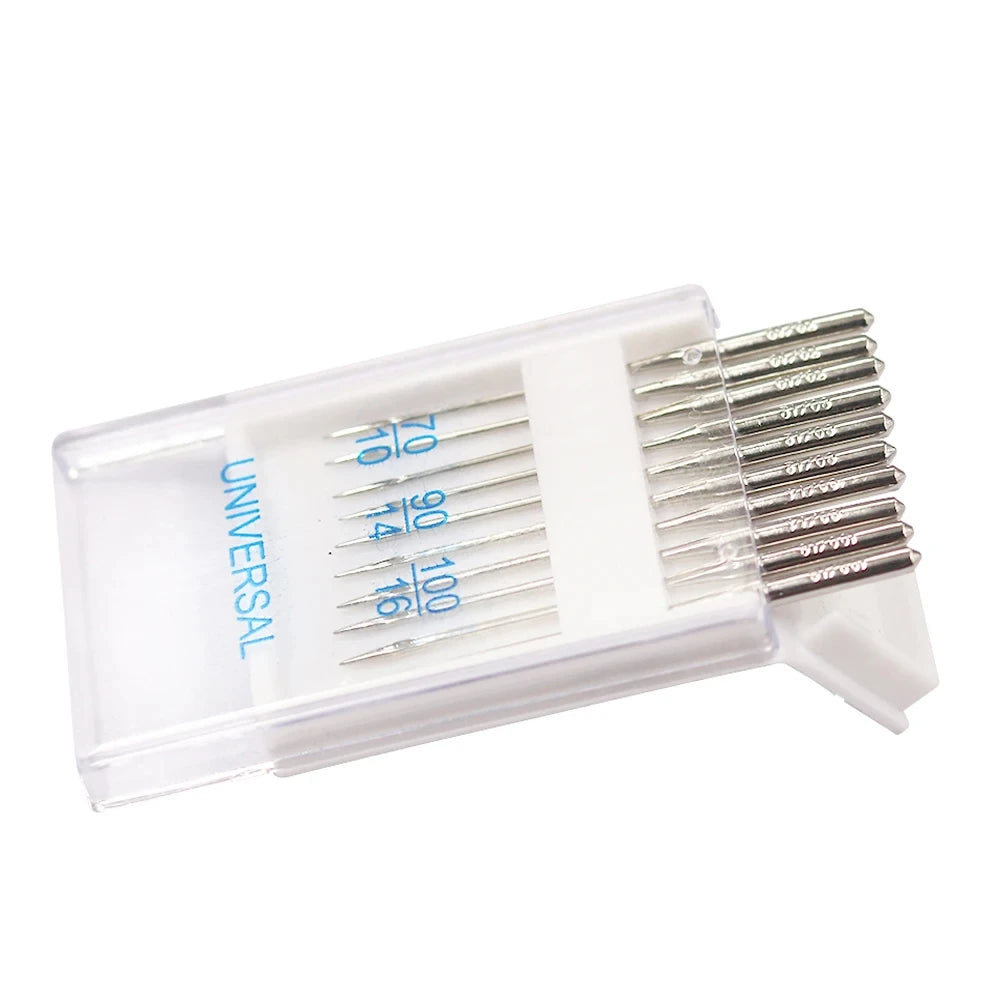 A clear plastic container holding a set of precision sewing machine needles with various sizes.