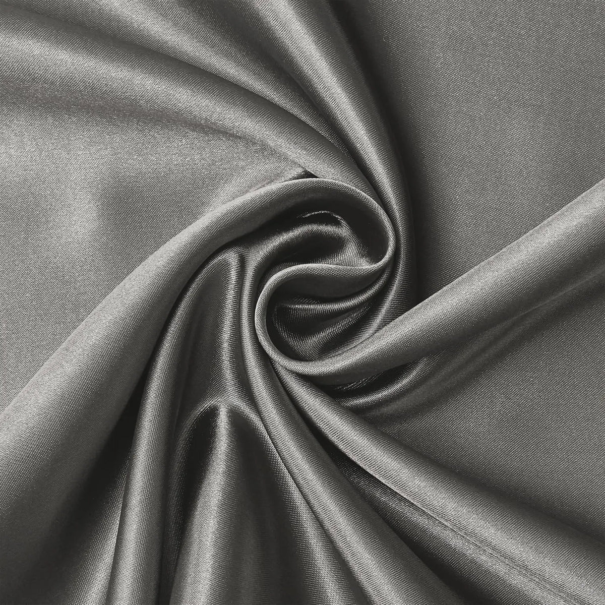 A close-up of a draped satin fabric in a gray tone showing soft folds and texture.