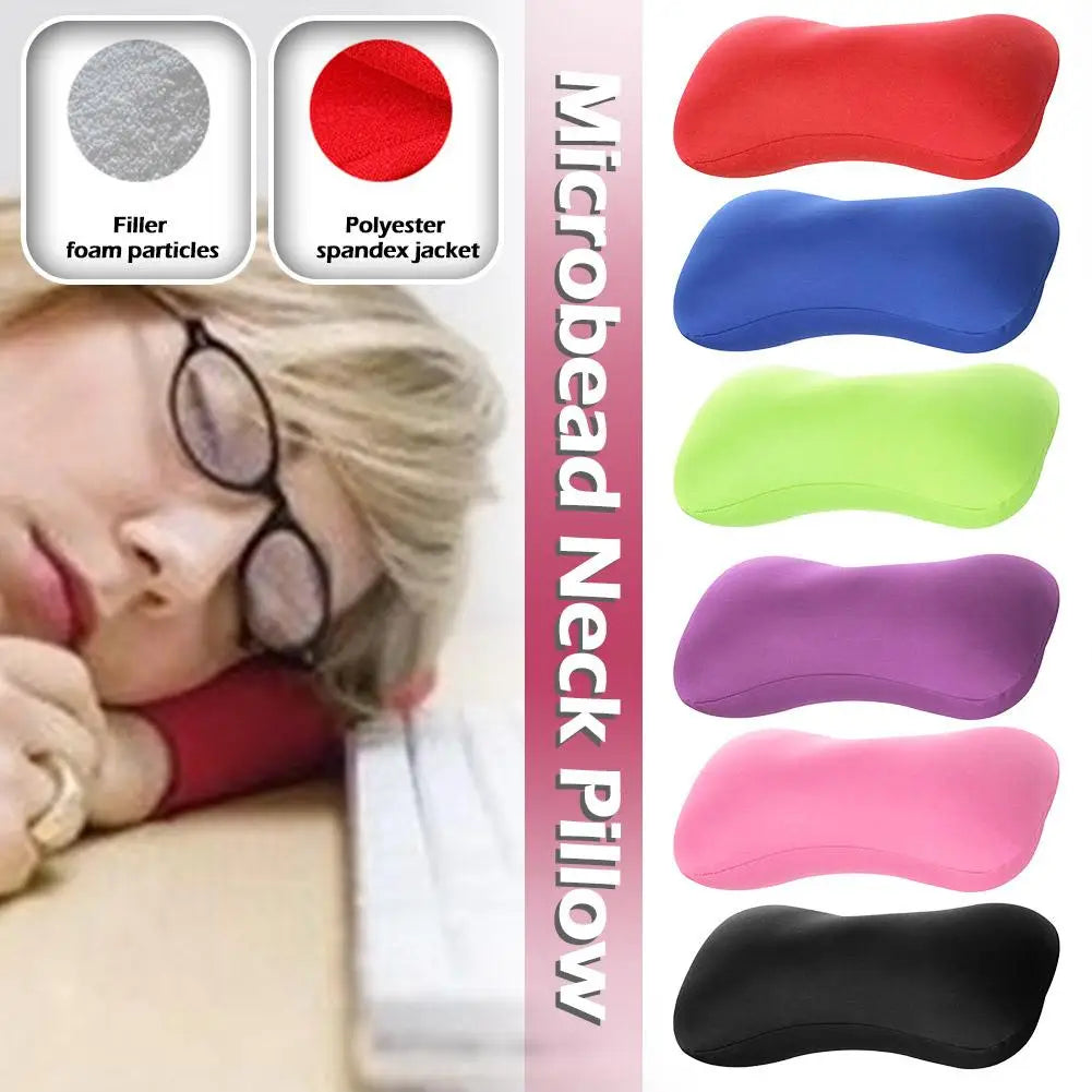 A collection of colorful microbead neck pillows in various shades including red, blue, green, purple, and black.