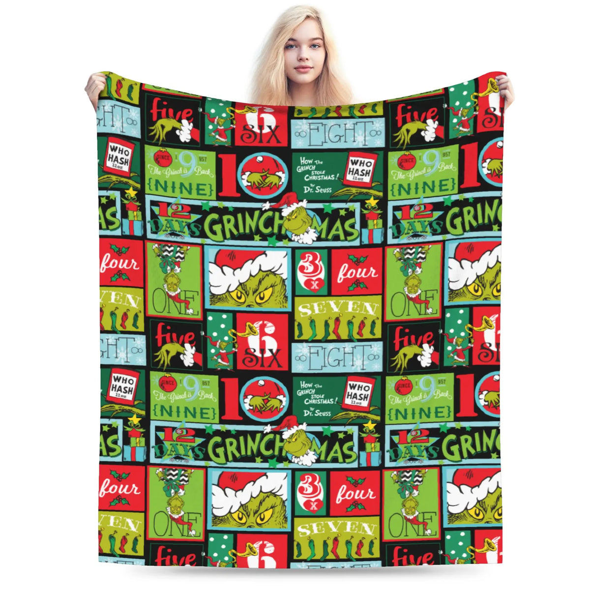 A colorful knitted throw blanket featuring various Halloween-themed graphics and text.