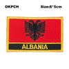 Red flag embroidered patch featuring a black eagle and the word ALBANIA on a black band.