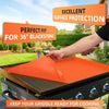 An orange silicone griddle mat cover is being placed onto a metal grilling surface for protection.