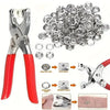 A set of 100 metal snap buttons and a press tool for fastening applications.