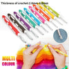 A set of multi-colour crochet hooks and needles with various thicknesses shown alongside a knitted item.