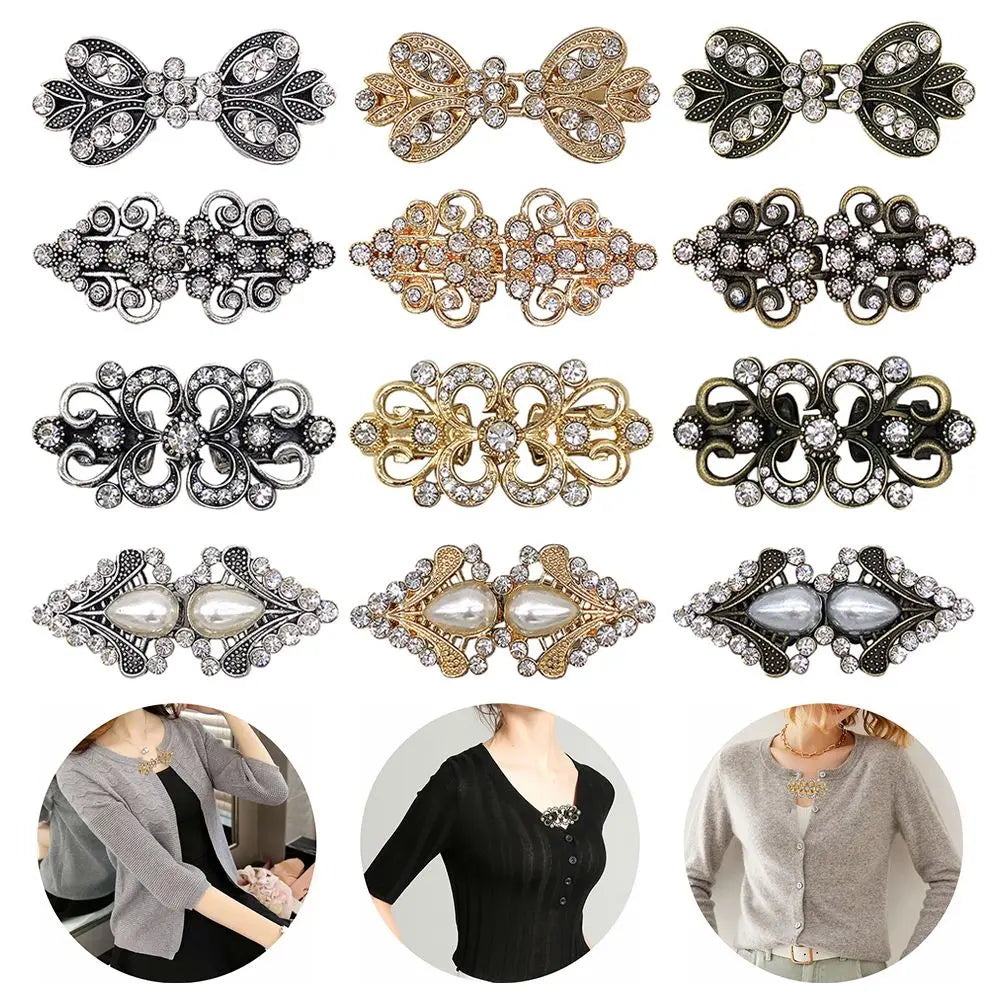A collection of vintage swirl clip brooches in silver and gold tones displayed against a white background.