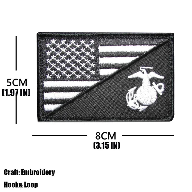 Black embroidered patch featuring the American flag and a trident design.