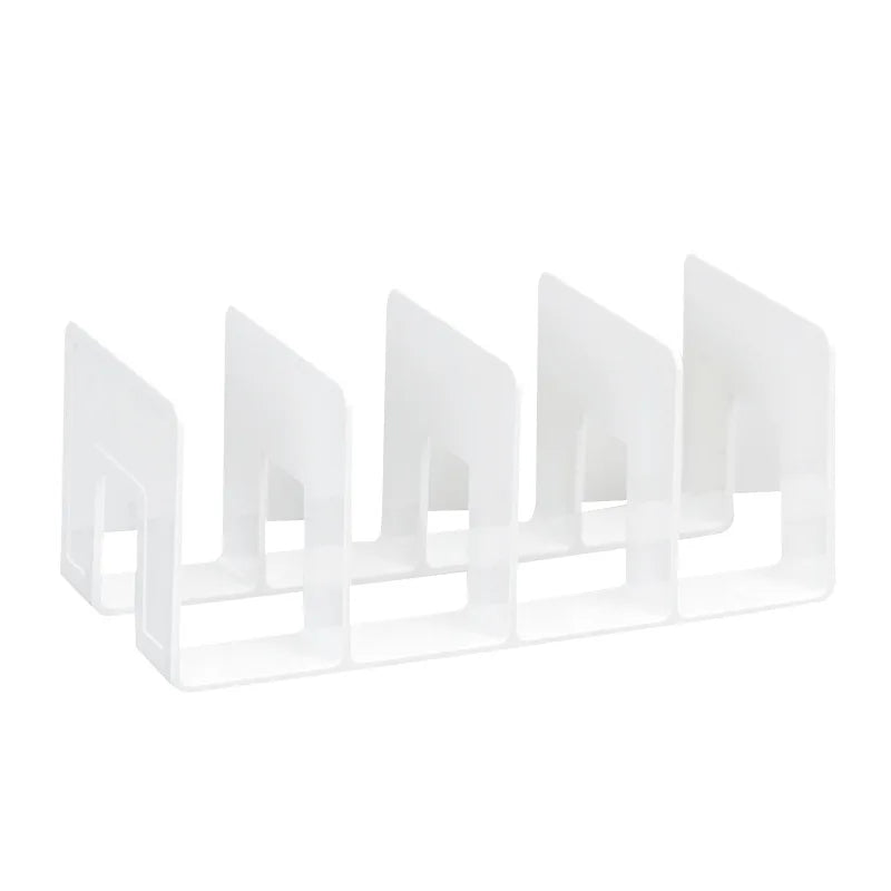 A white plastic storage organizer with four separate sections for organizing items.