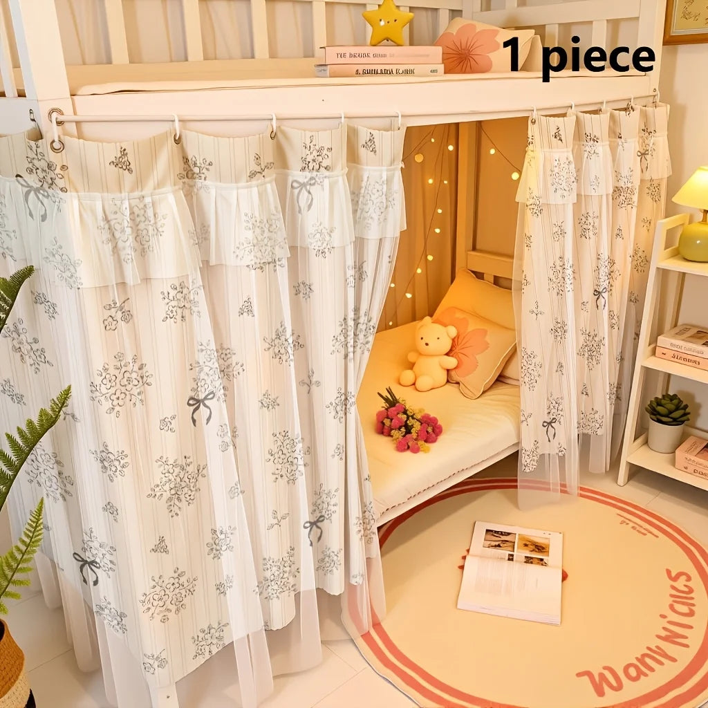 Double-layer mesh bed canopy with lace trim displayed on a white wooden shelf.