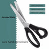 A pair of black lace hand-cut scissors with a serrated blade shown against a green background.