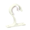 White heavy-duty curtain rod brackets and hooks for hanging curtains.
