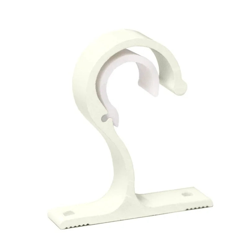 White heavy-duty curtain rod brackets and hooks for hanging curtains.