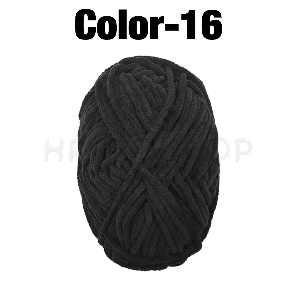 A ball of black Color-16 soft velvet chenille yarn for crafting.