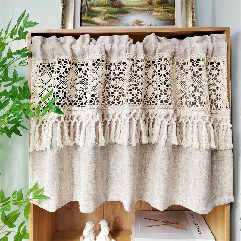Geometric lace short curtains in beige and cream hanging in a wooden shelf display