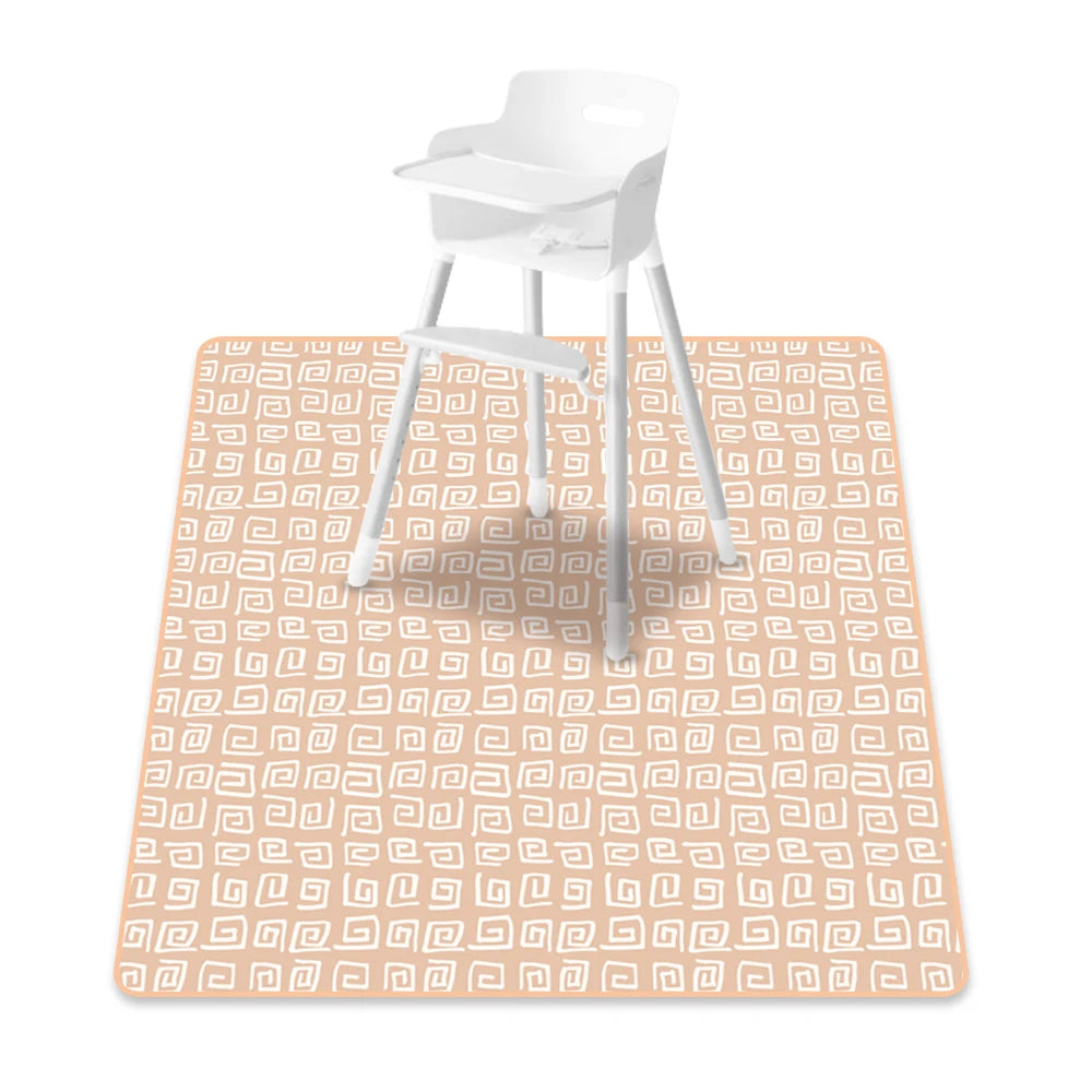A white plastic baby play mat with an orange geometric pattern is shown on a white background.