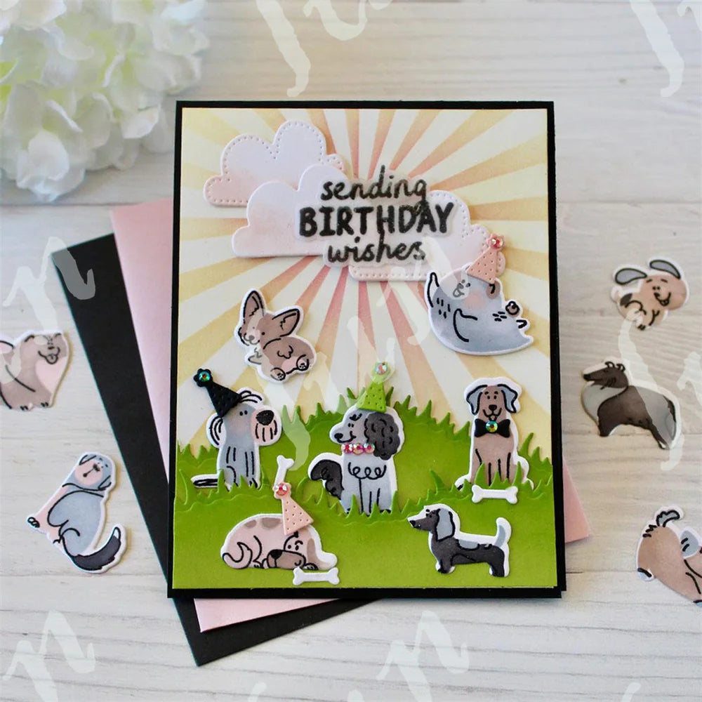 A card featuring a sunburst design with clouds and the text sending birthday wishes, surrounded by small dog silhouettes.