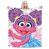 A plush blanket featuring a cartoon illustration of Elmo and Friends characters.