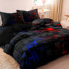 Black and blue geometric grid plaid duvet cover set displayed on a bed.