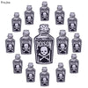 A collection of black glass bottles labeled POISON with skull and crossbones designs for DIY punk embroidery patches.