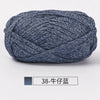A ball of dark blue hand-dyed fabric strip yarn for crochet and knitting.