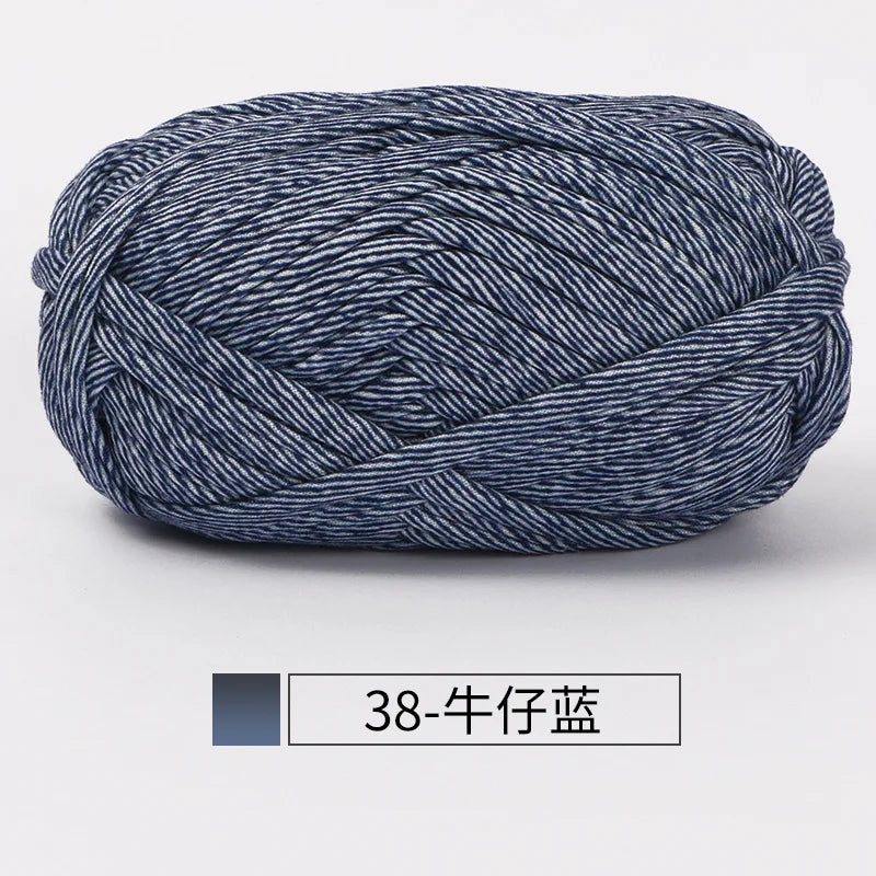 A ball of dark blue hand-dyed fabric strip yarn for crochet and knitting.