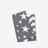 A folded gray and white patriotic fabric featuring stars and stripes pattern.