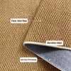 Close-up view of a natural jute rug showing its durable edge and anti-slip TPR backing.