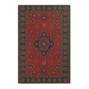 A rectangular area rug with a deep red field and intricate blue and gold geometric patterns.