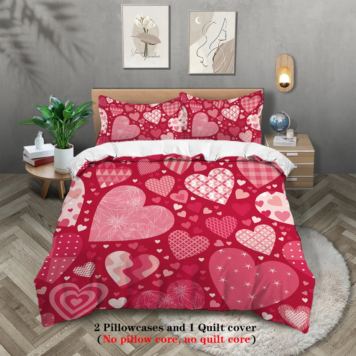 A red patterned comforter set featuring pink hearts and floral designs displayed on a bed.