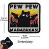 Black and yellow embroidered patch featuring a cat silhouette with text that reads Pew Pew and Madafakas!