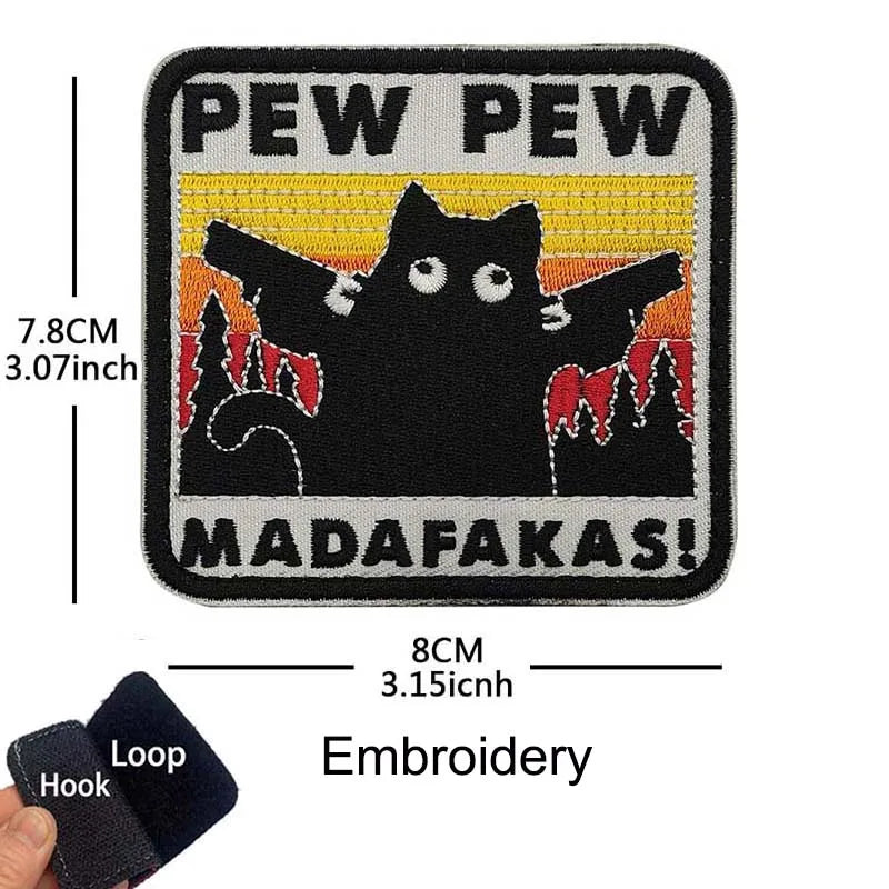 Black and yellow embroidered patch featuring a cat silhouette with text that reads Pew Pew and Madafakas!