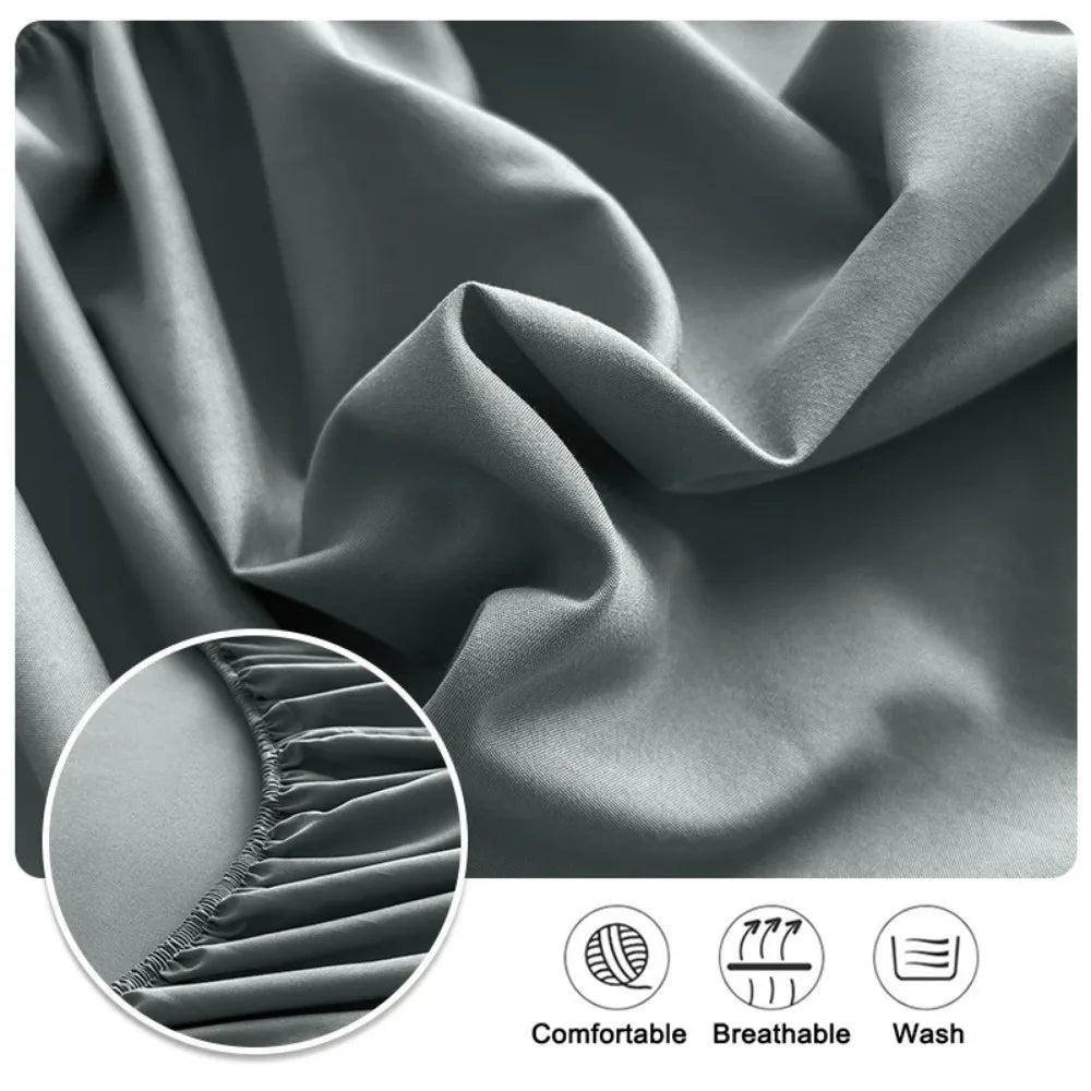 Close-up of a gray fitted bed sheet showing pleats and texture, highlighting comfort, breathability, and washability.