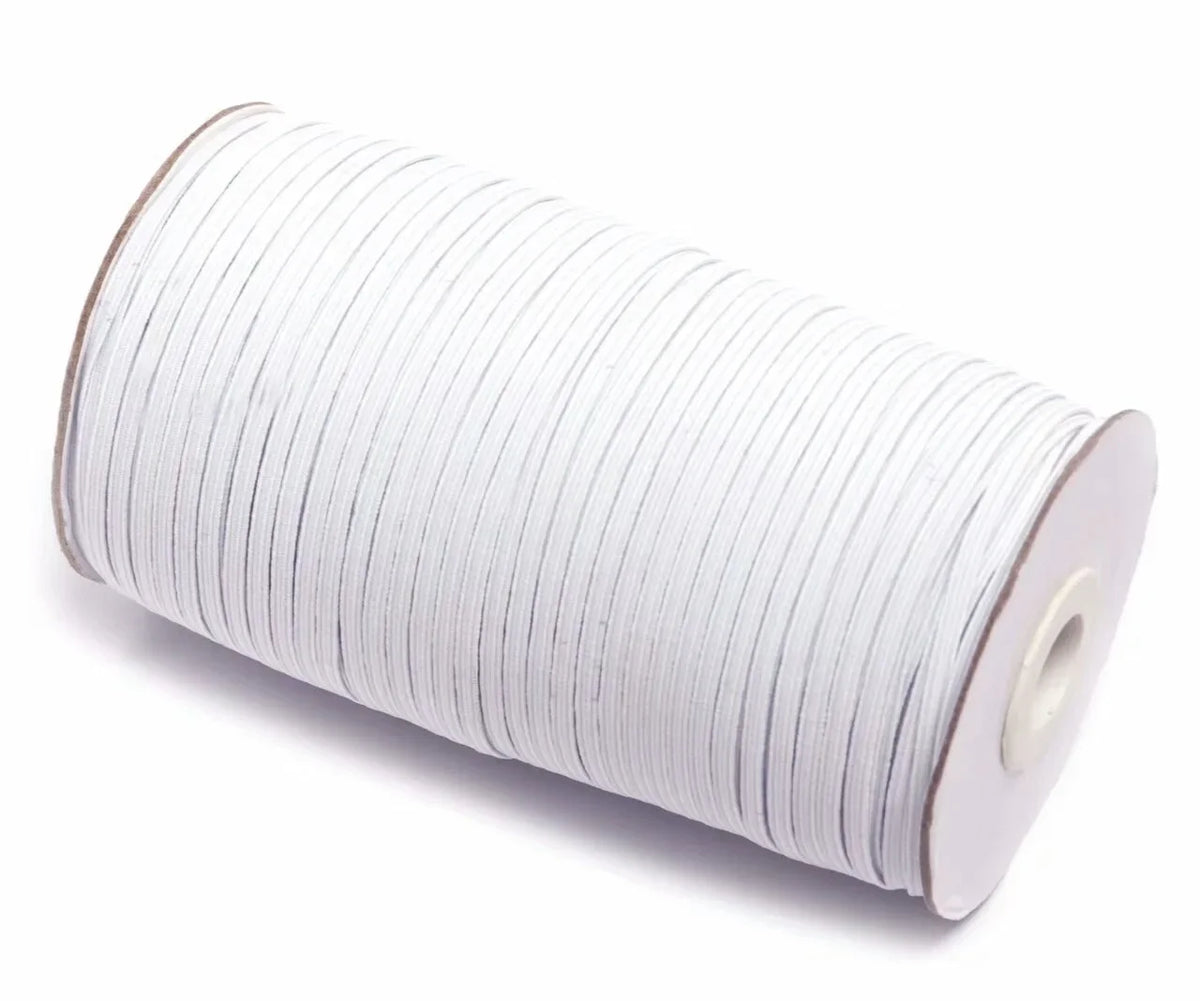 A roll of white adjustable elastic bands for garments.