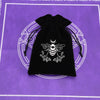 Black velvet tarot cards storage pouch with a white silhouette of a bee and crescent moon