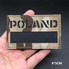 A rectangular tactical patch featuring a camouflage pattern with the word POLAND in dark lettering.